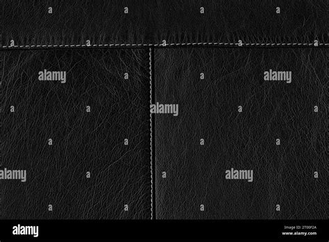 Black calf leather texture. The skin is bovine with stitching Stock Photo - Alamy