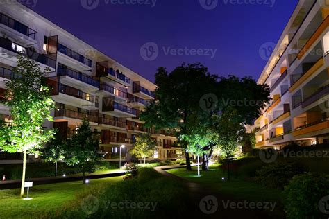 Exterior of apartment building at night 27852668 Stock Photo at Vecteezy