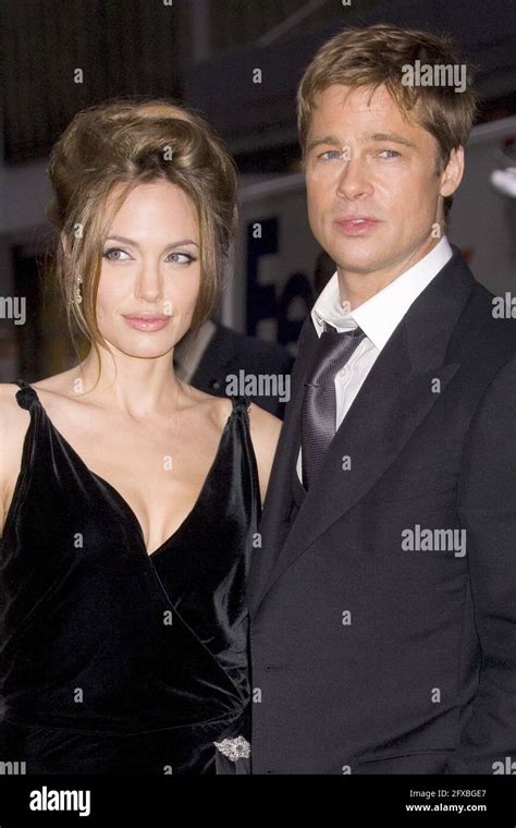 Actress Angelina Jolie and actor/producer Brad Pitt attend the premiere ...