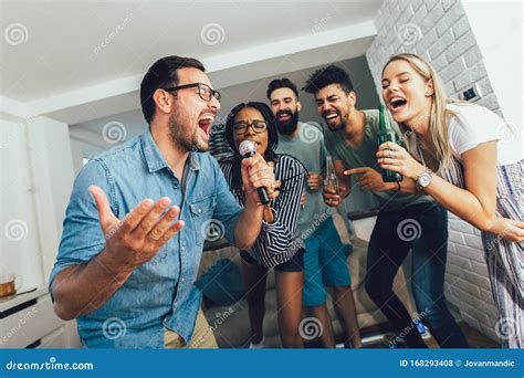 Friends Singing Together at Home. Karaoke Party Concept Stock Photo - Image of female ...