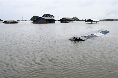 Myanmar floods force tens of thousands from homes