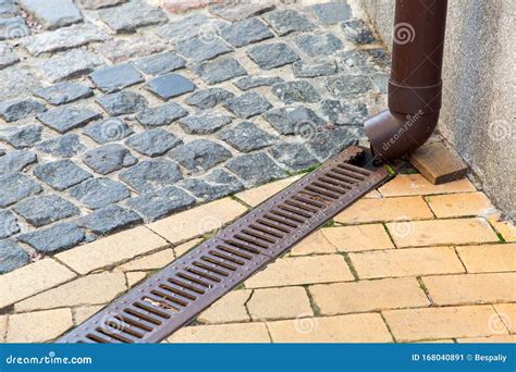 A Rainwater Drainage Pipe System Under a Pedestrian Pavement. Stock ...