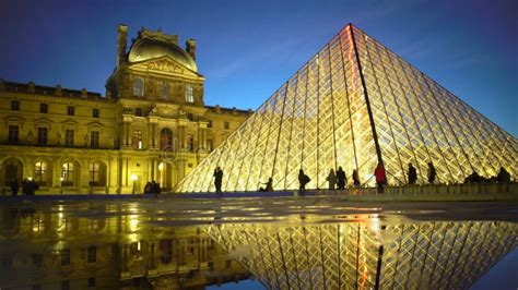 Louvre Pyramid Reflection on Water Surface, Silhouettes of Tourists at ...