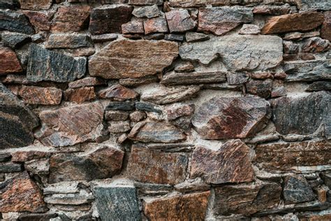 Old stone wall at the castle ruins. Texture of old weathered medieval stone wall 23415628 Stock ...