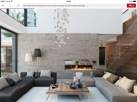 Salón doble altura con pared piedra | Modern houses interior, Modern ...