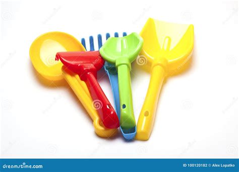 Colored Plastic Toys for the Sandbox on a White Background Stock Photo - Image of green ...