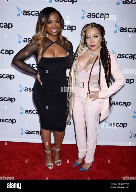 Kandi Burruss and Tameka "Tiny" Harris attending the 2018 ASCAP Pop Music Awards, held at the ...