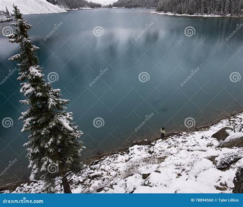 Girl Skipping Rocks on the Shore of a Blue Lake Stock Photo - Image of clouds, solitude: 78894560