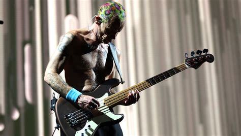 Flea: “Basslines take on a different type of melody with a pick” | Guitar World