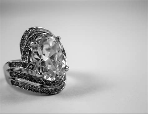 Grayscale Photo of 2 Silver With Diamond Rings · Free Stock Photo