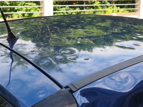 The Signs of Hail Damage: A Guide for Car Owners - Side Car