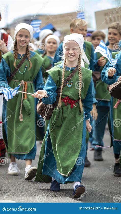 Estonian People in Traditional Clothing Walking the Streets of Tallinn ...