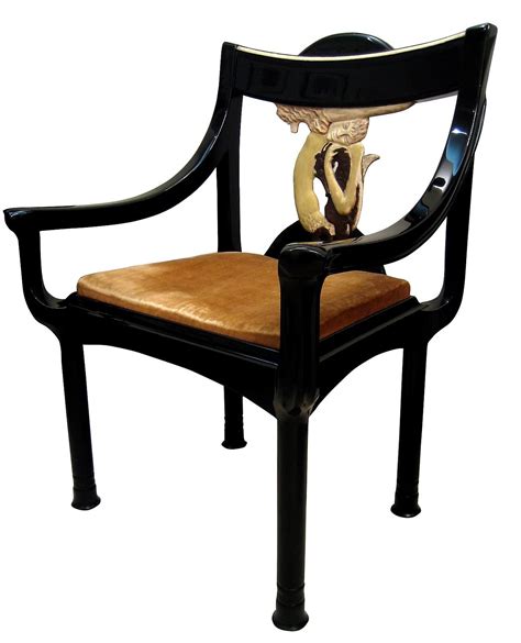 Eileen Gray (1878 - 1976) Sirène Chair (circa 1923) A "Sirène" armchair in black lacquer, the ...