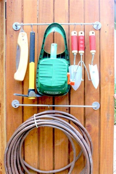S-Hooks for Gardening Supplies // 14 ways to Organize with S-Hooks // simplyspaced.com | Garden ...