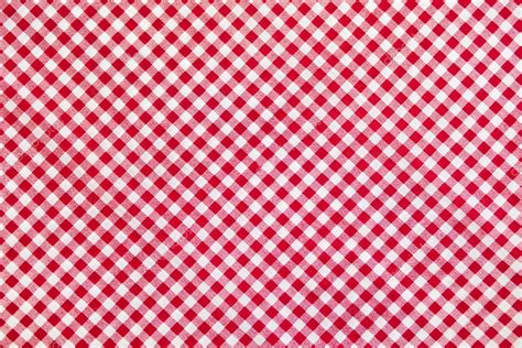 Red plaid fabric as background — Stock Photo © yurinonori #37757029