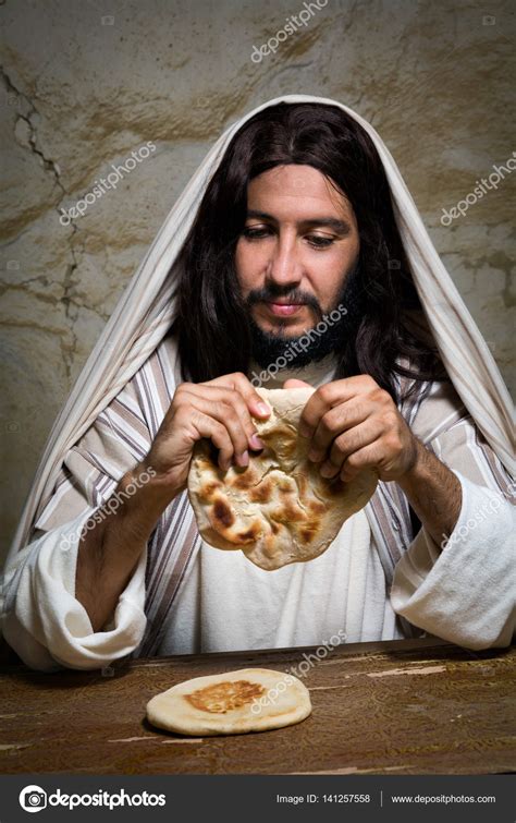 Breaking bread at Last Supper Stock Photo by ©Klanneke 141257558