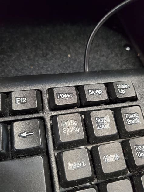 A "Power" button on 3rd party keyboard that instantly shuts down the computer without warning ...