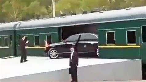 Kim Jong Un's Maybach Limo Seen Squeezing Into His Armored Train