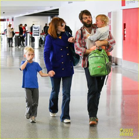 Bryce Dallas Howard and her husband Seth Gabel depart a flight at LAX Airport with their kids ...