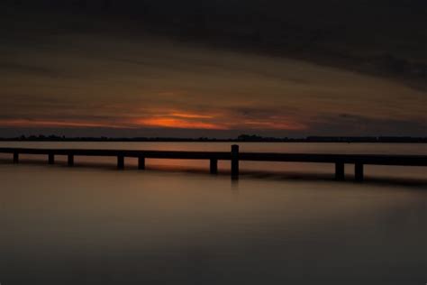 Fotos gratis : mar, Oceano, horizonte, muelle, nube, cielo, amanecer, puesta de sol, puente, luz ...