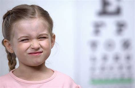 Squinting: Causes & Treatments - All About Vision