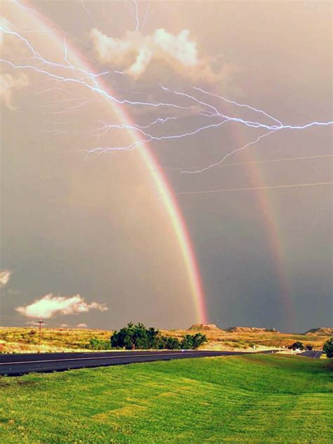 Here’s a stunning photo of a double rainbow and a lightning strike. You’re welcome. - The ...