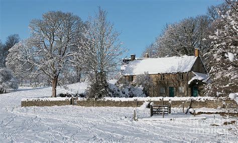 Cotswold Cottage in the December Snow Photograph by Tim Gainey - Pixels