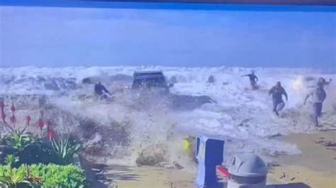 California: Rogue wave rips past Ventura seawall as beachgoers flee ...