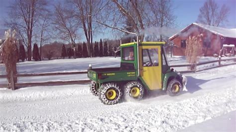 Plowing Snow with John Deere 6x4 Gator w/72" Front Blade - YouTube