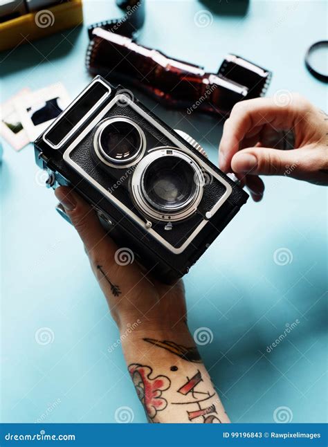 Hands with Tattoo Holding a Camera Stock Image - Image of entertainment ...