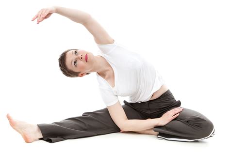 Flexible Woman Doing Seated Yoga Pose
