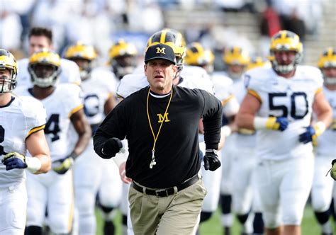 A Michigan Coach Appears To Have Revealed The Team's Starting QB - The Spun