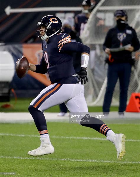 Nick Foles of the Chicago Bears scrambles in the first quarter ...