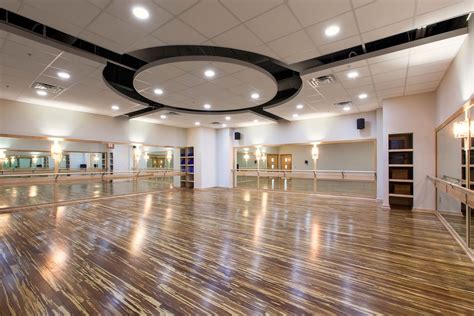 Yoga Studio with Calming Lighting and Stained Hardwood Floors #EFC # ...