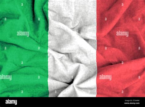 Italian flag of Italy State with vibrant colors and fabric background ...