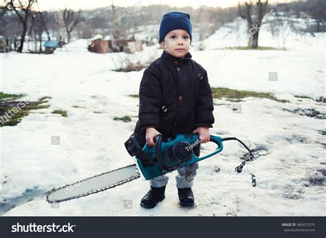 Child Holding Chainsaw Dangerous Play Concept Stock Photo 484413379 | Shutterstock