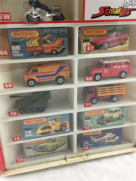 Sold Price: MATCHBOX ROTATING STORE DISPLAY WITH 75 MATCHBOX CARS - January 6, 0122 10:00 AM EST