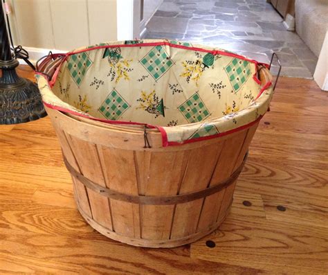 Vintage wooden laundry bushel basket with fabric liner