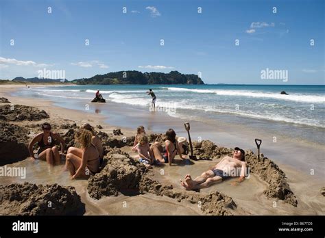 Relaxing in Thermal Pools, Hot Water Beach, Coromandel Peninsula, North Island, New Zealand ...