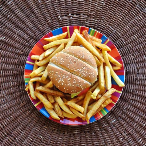 Cheeseburger and French Fries Stock Photo - Image of potatoes, cheese ...