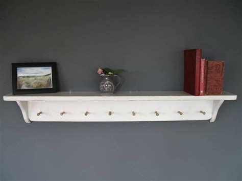 Traditional Cottage Style Shelf With Wooden Pegs | Shelves, Traditional cottage, Cottage style