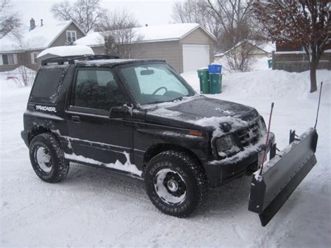 Fourtitude.com - Truck that can plow snow, warm your buns, and still ...