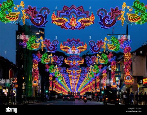 Colourful street lights and decorations celebrating Diwali or Deepavali festival of lights in ...