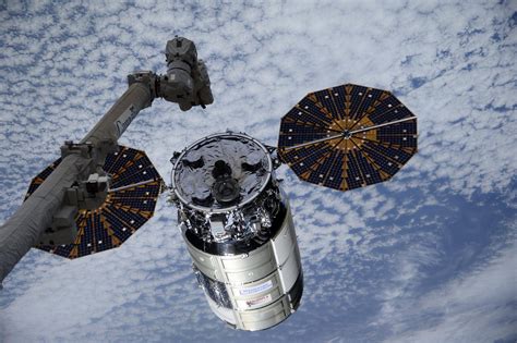 Cygnus Space Freighter Docked at Space Station to Deliver New Space Toilet, Science Experiments ...