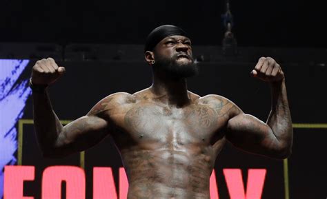 Tyson Fury, Deontay Wilder weigh in big for their big heavyweight fight | Inquirer Sports