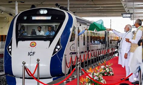 PM Modi flags-off Gandhinagar-Mumbai Vande Bharat Express: Check pics | Zee Business