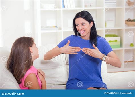 Deaf Girl Learning Sign Language Stock Photo - Image of close, implant ...