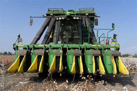 John Deere type cotton picker, 6 rows in a cotton field during picking Stock Photo | Adobe Stock