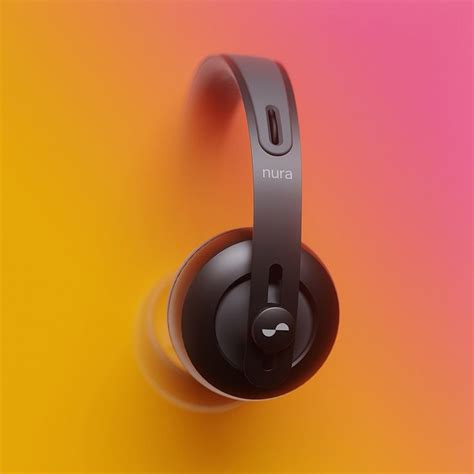 the headphones have been placed on an orange and pink background