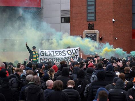 Two people arrested as Manchester United fans protest against owners ahead of Liverpool match ...